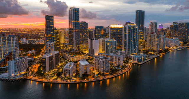 An aerial view of Miami's skyline, taken from the water.