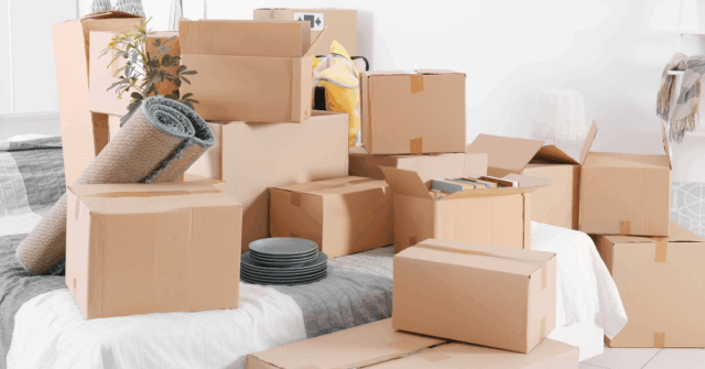 A collection of moving boxes ready for the movers to load.